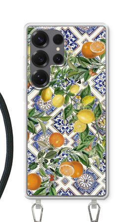 Blå kakelplattor, citroner och apelsiner