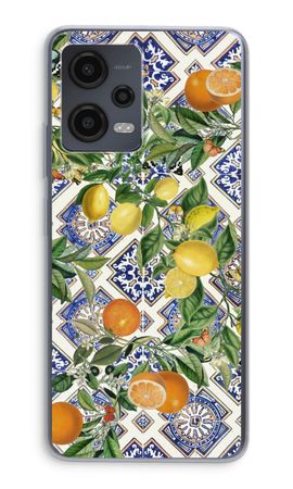 Blå kakelplattor, citroner och apelsiner