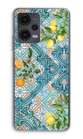 Blå kakelplattor, citroner och apelsiner