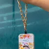 Gold-Colored Phone Wristlet