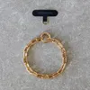 Gold-Colored Phone Wristlet